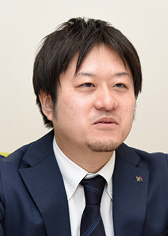 Executive portrait of a person in a suit used for the Toppan Forms case study.