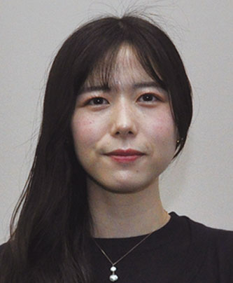 Portrait photo of a Fujifilm case study speaker, identified as Yuasa, used for AWS Japan solution case studies.