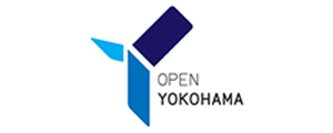 Logo of Open Yokohama featuring blue and navy geometric shapes and the text 'OPEN YOKOHAMA'.