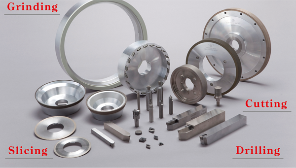 A collection of diamond tools manufactured by Tokyo Diamond Tools, designed for grinding, slicing, cutting, and drilling applications. The image displays various precision industrial tools including grinding wheels, cutting blades, and drilling bits.