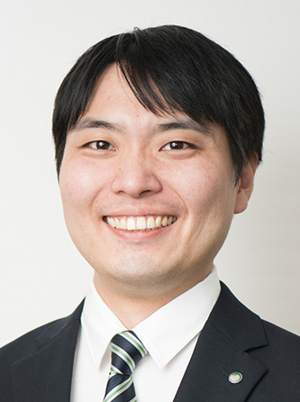 Business portrait of a man in a suit and tie, smiling