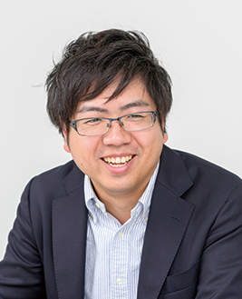 Portrait of a man with glasses in a suit, smiling at the camera, used for Allconnect solution case studies.