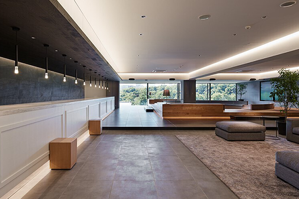 Modern office interior of Mediado featuring open seating, large windows, and contemporary design, highlighted in an AWS case study.