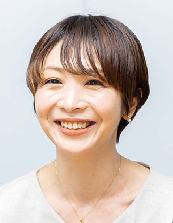 Portrait of a smiling woman with short brown hair