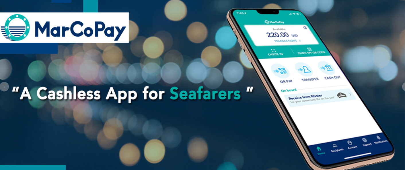 Promotional image for MarCoPay featuring a mobile phone displaying the MarCoPay app with the tagline 'A Cashless App for Seafarers' on a blurred bokeh background.
