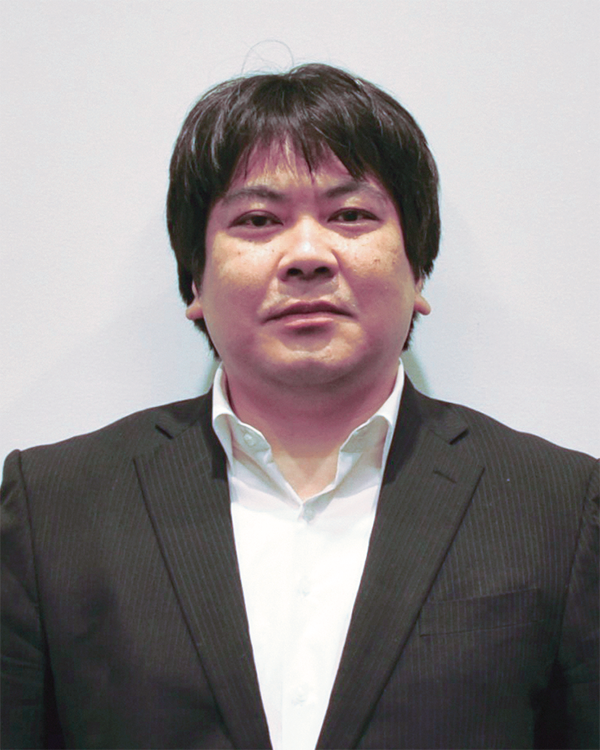 Portrait of a man in a suit, used as the speaker photo for a 2023 NRI case study.