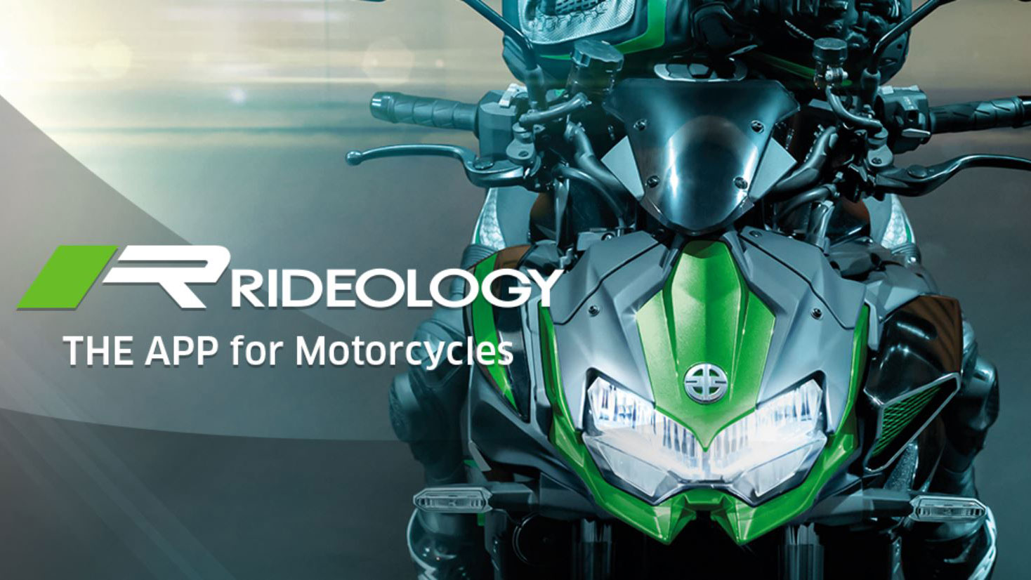 Promotional image featuring the Kawasaki Rideology motorcycle app with a close-up view of a green Kawasaki motorcycle and the app's logo and tagline 'THE APP for Motorcycles.'