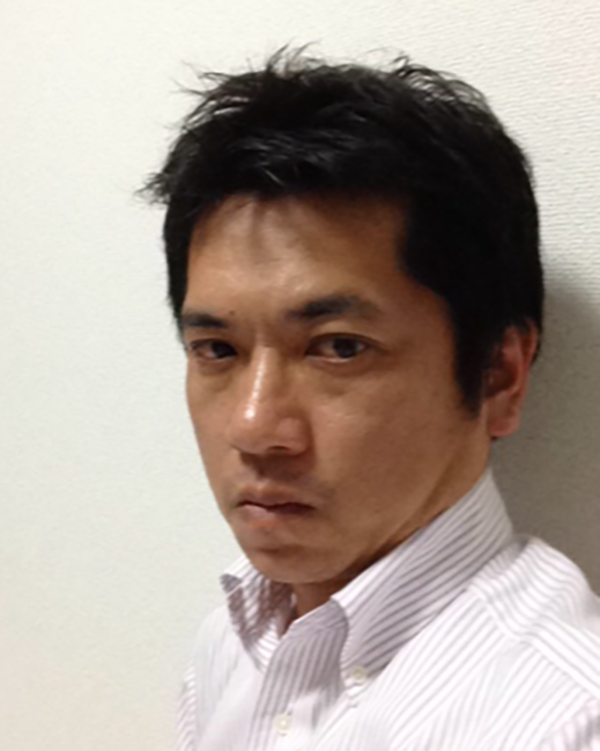 Portrait of a speaker associated with the Furuno case study, wearing a light-colored shirt and standing against a plain background.