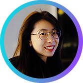 Profile photo of a woman wearing glasses and smiling