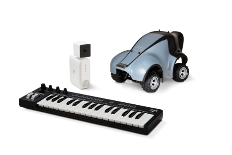 A set of machine learning training equipment including a miniature car, a keyboard, and a camera device, typically used for educational purposes in artificial intelligence and robotics.