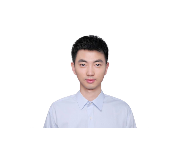 A professional headshot of a person wearing a white shirt, photographed against a plain white background.