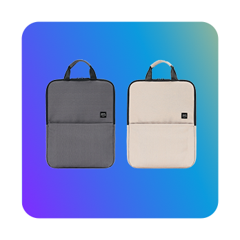 Two laptop sleeves, one gray and one beige, displayed side by side on a blue-to-green gradient background.