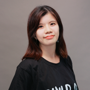 Professional portrait of a woman with shoulder-length hair wearing a black shirt, photographed against a neutral background. Suitable for use as a session speaker or attendee profile image.