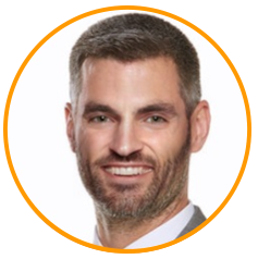 A professional headshot of a man in a suit, displayed within an orange circular frame on a white background.