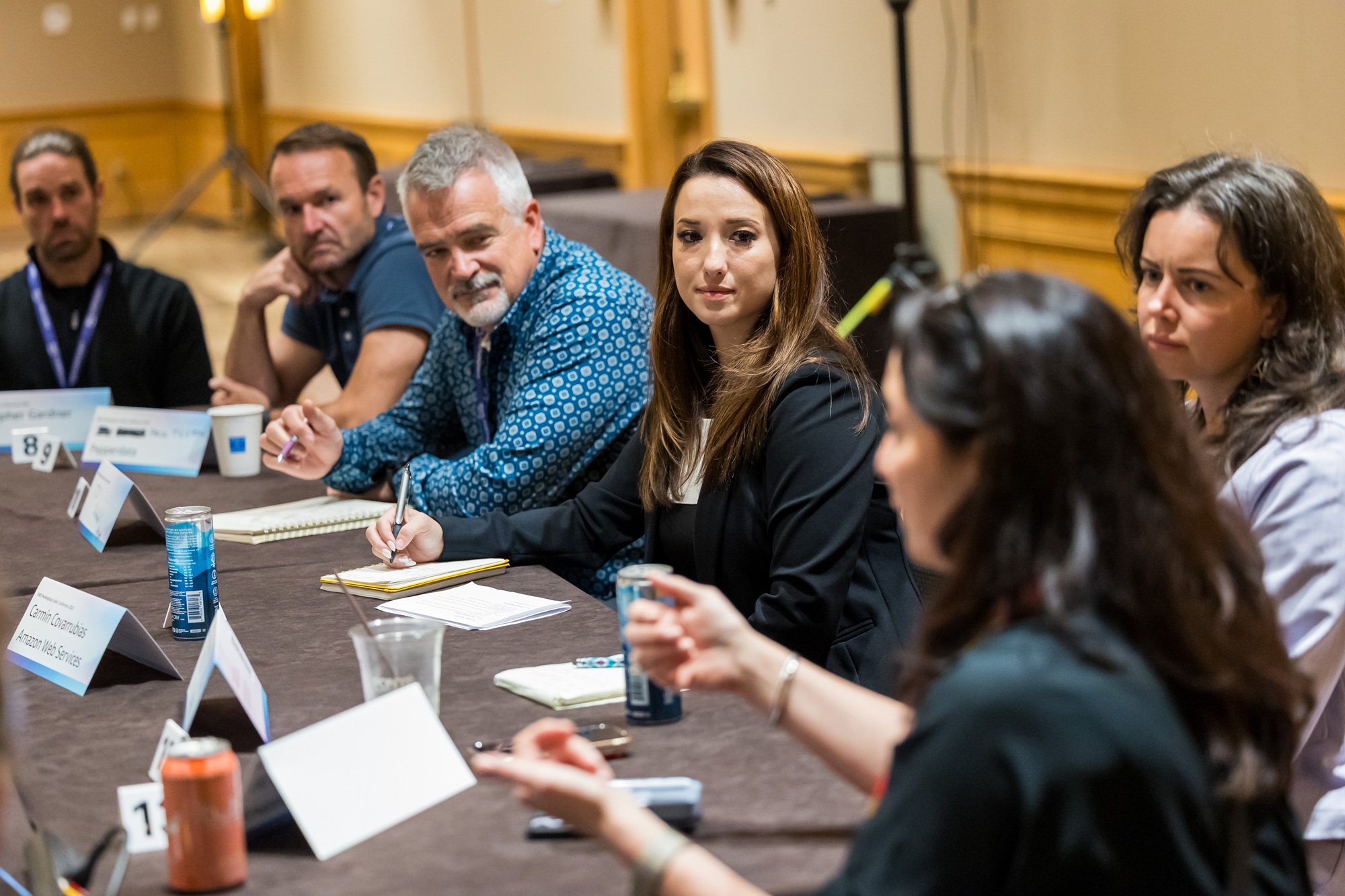 Group of AWS Seller Conference professionals conducting a Roundtable Session