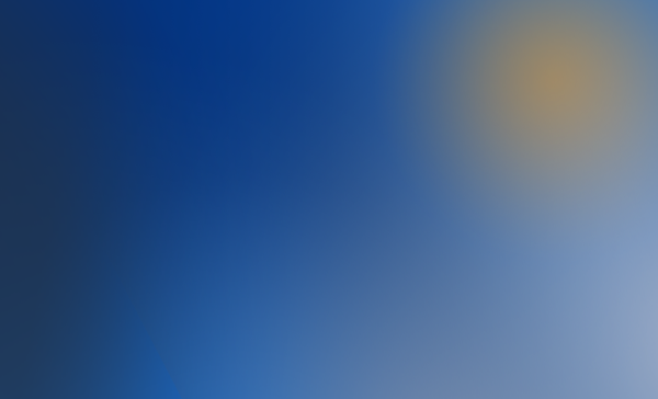 A blue gradient background image featuring a soft yellow light effect in the upper right corner.