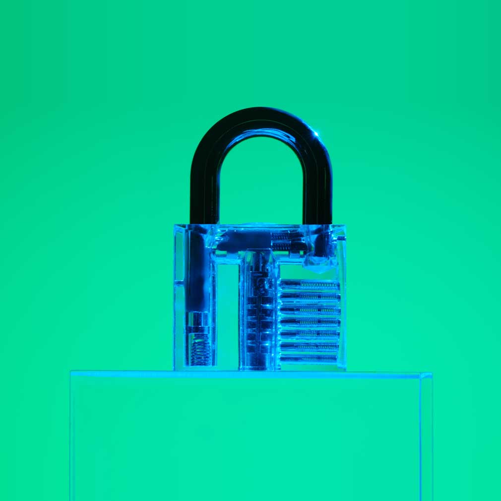 A green background with a lock and key in the foreground, signifying security and privacy