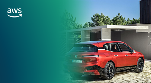 Red BMW car parked in front of house