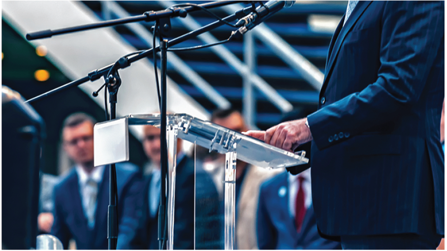 Photo: of a Public Sector official making a speech